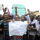 Workers carry placard to campaign for the release of schoolgirls kidnapped by Boko Haram Islamist terrorists almost a month ago during worker's rally in Lagos, Nigeria, on May 1, 2014.
PIUS UTOMI EKPEI/AFP/Getty Images